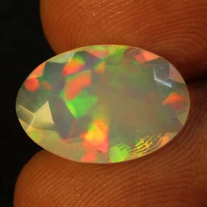 3.05Cts Natural Color Play White Opal 15x10.2x5mm Oval Faceted Loose Gemstone - Picture 1 of 6