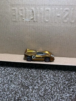 De colección 1968 Hot Wheels Redline McLaren M6A dorado Foto 1 de 3