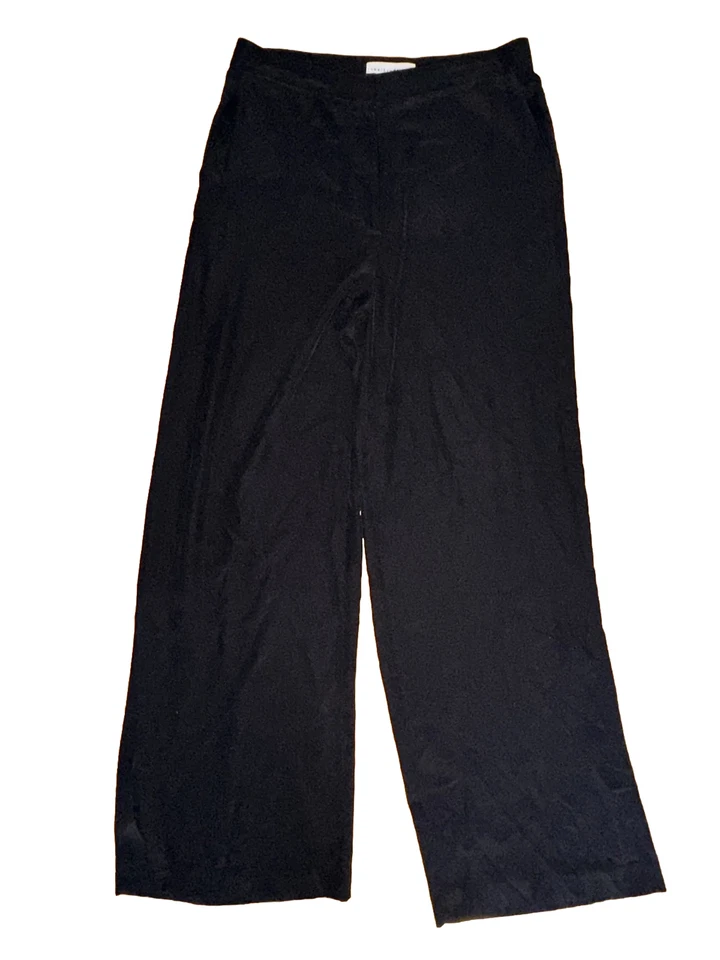 Pantalones ROBERT RODRIGUEZ Detalle de abertura lateral Pierna ancha 100% SEDA 10 negros $365 Foto 1 de 4