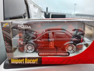 Jada Toys Import Racer Mitsubishi Lancer Evolution VI G-Racing escala 1:24 negro Foto 1 de 2