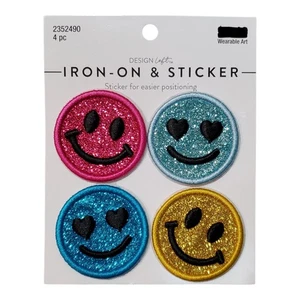 Toppe adesive e stirate con faccine sorridenti glitterate - Foto 1 di 4