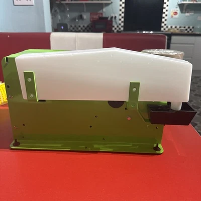 Dispensador manual de cinta de papel engomado para embalaje de cometas - Imagen 1 de 4