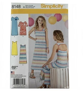 Vestidos tejidos para niñas con patrón Simplicity #8148A talla EE. UU. 8-16 2016 - Imagen 1 de 10