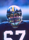 Defensive lineman Gary Dunn of the Pittsburgh Steelers looks on - 1983 Old Photo