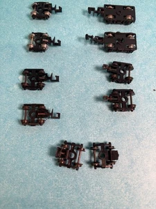 N Scale 4 Pairs Wheels/Trucks And Couplers Plus 1 Pair Trucks/Wheels wo Couplers - Picture 1 of 3