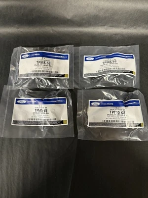 COMPLETE SET OF 4 OEM FORD F150 F250 F350 SUPER DUTY TPMS TIRE PRESSURE SENSORS. - Image 1 of 3