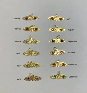 "Ojos de Santa Lucía"" reversibles de oro amarillo de 10 quilates con piedras - Imagen 1 de 14