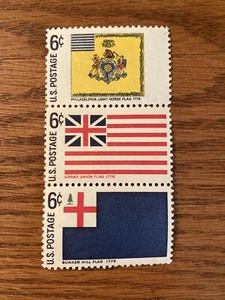 Strip of 3 U.S. Stamps featuring colonial flags - Picture 1 of 1