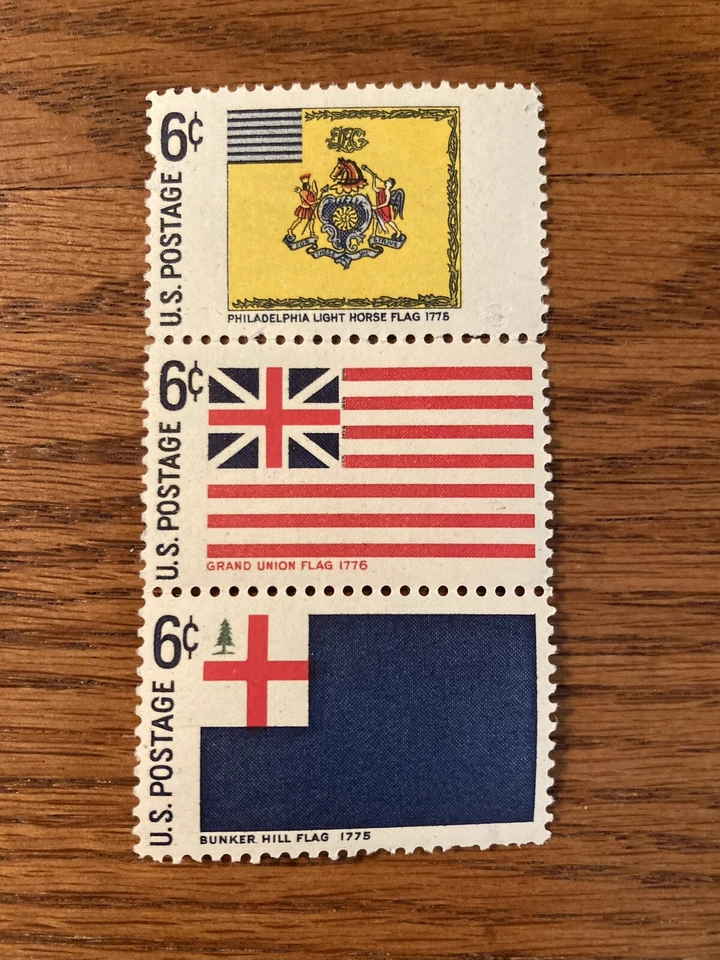 Strip of 3 U.S. Stamps featuring colonial flags - Image 1 of 1