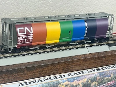 CANADIAN NATIONAL " RAINBOW / CIRCUS " CYLINDRICAL 4 BAY HOPPER CAR HO Scale NEW - Image 1 of 4