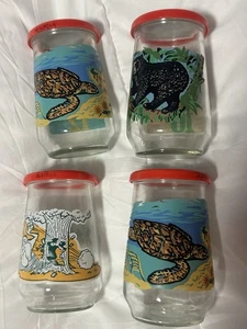 Set di 4 barattoli di gelatina vintage Welchs - 3 specie in via di estinzione e 1 Looney Tunes - Foto 1 di 6