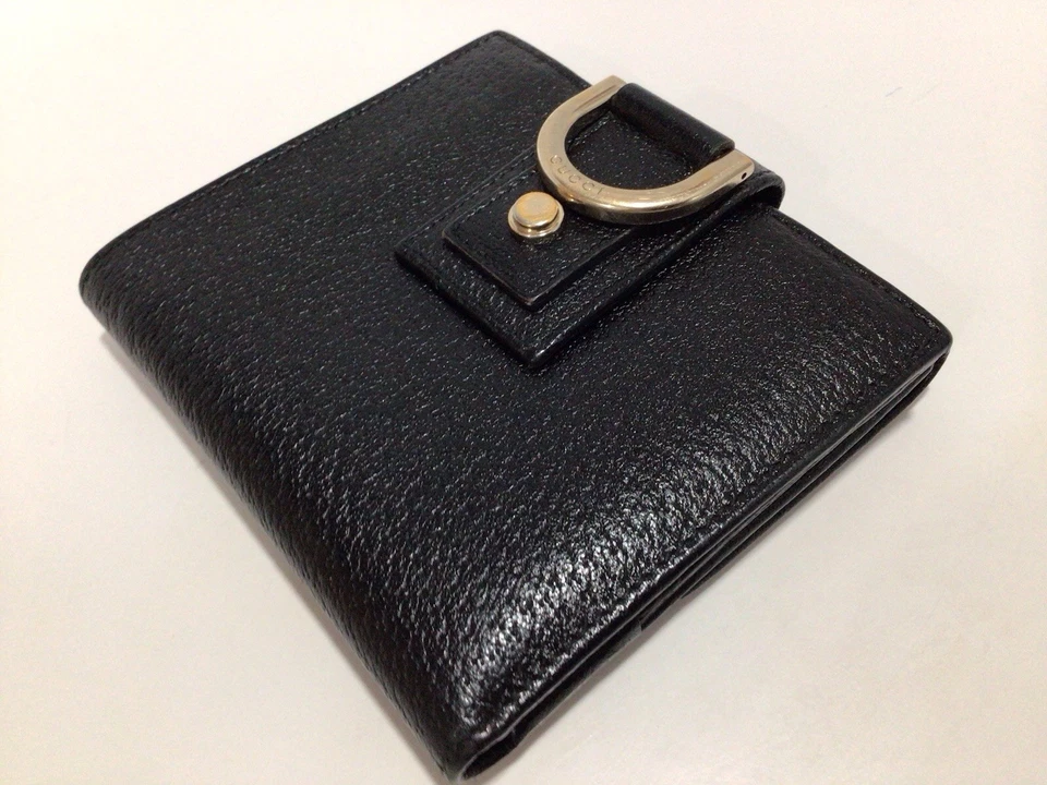 CARTERA DE CUERO NEGRA GUCCI para damas / Bolso protector Gucci Foto 1 de 4