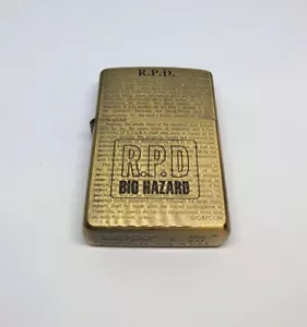 Resident Evil Zippo RPD Gold Limited Edition Lighter From Japan Open Box - Picture 1 of 6