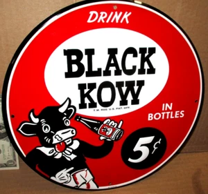 BLACK KOW --- En botellas 5c -- SIGNO REDONDO 12" -- Muestra a la vaca bebiendo de la botella - Imagen 1 de 9