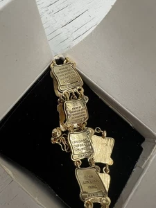 Zehn Gebote Armband Exodus goldfarben 6,75"-8" Neu Avon OVP - Bild 1 von 2