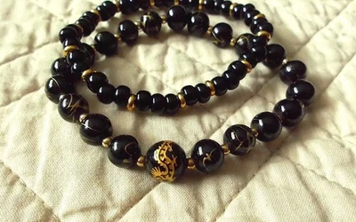 7.5" JUEGO PULSERA ELÁSTICA CON CUENTAS DRAGÓN AUDAZ NEGRO Y DORADO con SKIMMER Juego de 2 Foto 1 de 4