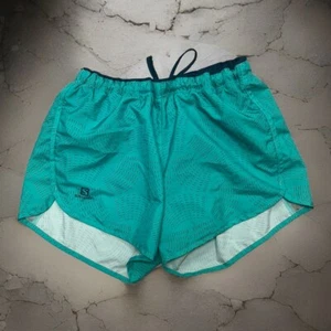 Pantalones Cortos Grandes Salomon Para Mujer Forrados Azul Teal Bolsillo Correr Atlético - Imagen 1 de 6