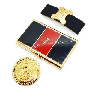Juego de 3 broches tarjeteros Celine Yves Saint Laurent y otros metal dorado 2754562 - Imagen 1 de 11