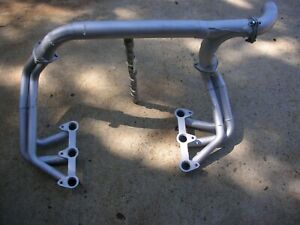 Corvair  Mid engine Headers may fit rear engine buggies also.  Fit all motors