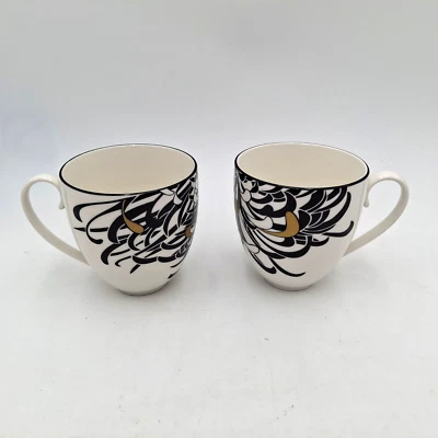 Par de tazas de crisantemo Denby Monsoon blancas con negro y dorado Foto 1 de 4