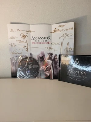 Assassin's Creed Brotherhood Poster Bonus Content Blu Ray Disc & Art Book - Image 1 of 4