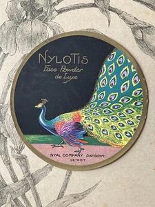 Ancienne étiquette Nylotis Nyal Company Détroit Parfum Boite à Poudre Paon - Picture 1 of 2