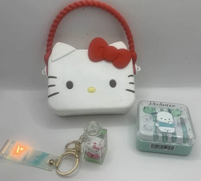 HELLO KITTY Sanrio Silicone Hand Bag Purse Small Tote Pochaco Wire Earbuds Charm - Image 1 of 4