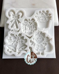 Christmas Silicone Mold: Santa, Bells, Present, Candy Cane, and Cupcake cavities - Picture 1 of 5