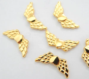 30 Flügel 20mm Engelflügel gold hell mit Herz Schutzengel basteln Perlenengel - Bild 1 von 1