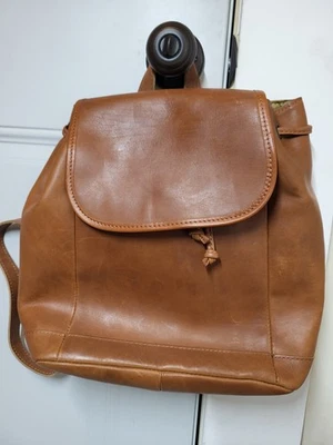 Mochila de cuero marrón frijol L.L con cordón superior bolsillo interior con cremallera  Foto 1 de 4