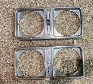 1975 1976 1977 1978 Ford LTD Headlight Bezel LH & RH Pair 3 Lions(MISSING ONE) - Picture 1 of 7