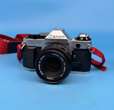 Canon AE-1 Program fotocamera reflex pellicola con obiettivo Canon FD 50 mm F/1.8 - Immagine 1 di 4