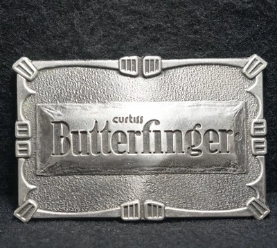 WI03158 *NOS* VINTAGE AÑOS 70 ***CURTISS BUTTERFINGER*** CANDYBAR HEBILLA DE CINTURÓN PARA HOMBRE Foto 1 de 2