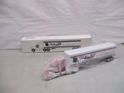 Remolque tractor Ertl Turkey Hill Navistar 1/64 Foto 1 de 3