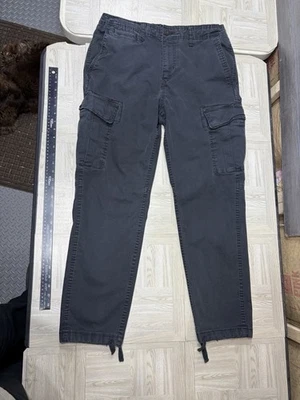 Pantalones cargo American Eagle ajustados vividos talla 34x32 bolsillos negros cómodos flexibles Foto 1 de 4