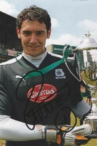 PLYMOUTH: ROMAIN LARRIEU SIGNED 6x4 TROPHY CELEBRATION PHOTO+COA - Picture 1 of 1