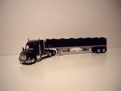 DCP FIRST GEAR 1/64 BLACK KW T680 WITH 52" SLEEPER AND WILSON GRAIN TRAILER - Image 1 of 4