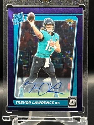 2021 Donruss Optic Trevor Lawrence Rated Rookie Auto Purple Stars RC #'d 42/50 - Image 1 of 3