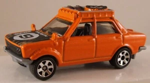 MATCHBOX #94 '70 Datsun 510 Rally Car 6-spoke wheels, 2017 issue (LOOSE / MINT) - Picture 1 of 3