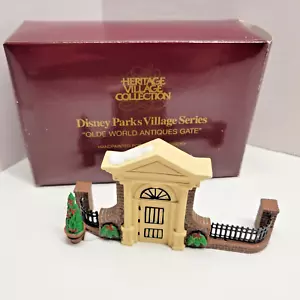 Department 56 Disney Park Olde World Antiques Gate Heritage Village Series 53554 - Picture 1 of 11