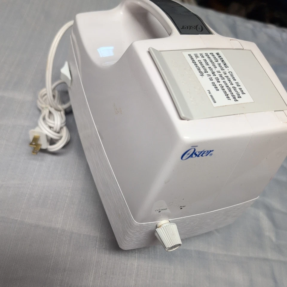 Trituradora de hielo Oster Snowflake Counter Top 564A probada excelente estado Foto 1 de 4