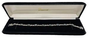 Tharpe 925 Sterling Silver 7" Tennis Bracelet with 9 Blue Topaz Stones - Picture 1 of 8