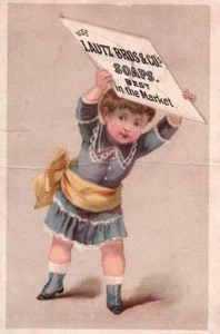 Lovely GIRL CARRIES SIGN For LAUTZ BROS. SOAP On Colorful Victorian Trade Card - Picture 1 of 2