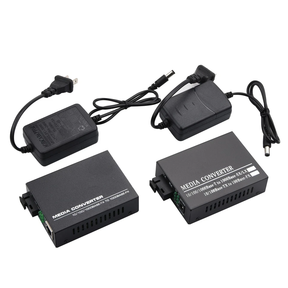 10/100/1000M Ethernet to Fiber Optic Media Converter 4 RJ45 & 1 SC fiber Port - Image 1 of 4