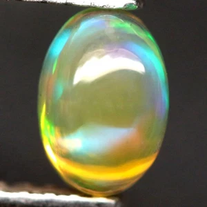 0,41 ct. Pietra Preziosa Opale Cabochon Ovale Multicolore Glitterato Arcobaleno 3D Etiope - Foto 1 di 7