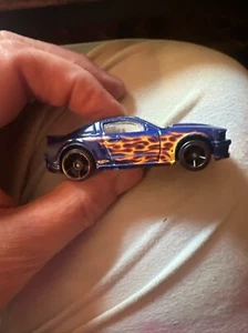 Hot Wheels Heat Fleet '07 Ford Mustang Blue with Flames Diecast toy car - Picture 1 of 6