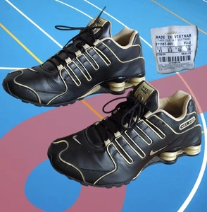 2009 Nike Shox NZ Womens Size 11 Black & Gold Shoes Low Top Sneakers 311137-091 - Picture 1 of 13
