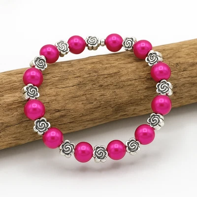 Pulsera elástica elástica elástica de 8 mm con perlas de vidrio rosa intenso y flores de plata tibetana Foto 1 de 3