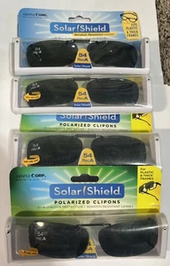 Occhiali da sole Solar Shield polarizzati clip on 54 Rec A lenti grigie senza montatura 4 paia - Foto 1 di 3