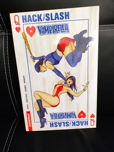 Dynamite Hack Slash VS Vampirella The Heart Is A Lonely Killer Graphic Novel TPB - Picture 1 of 10